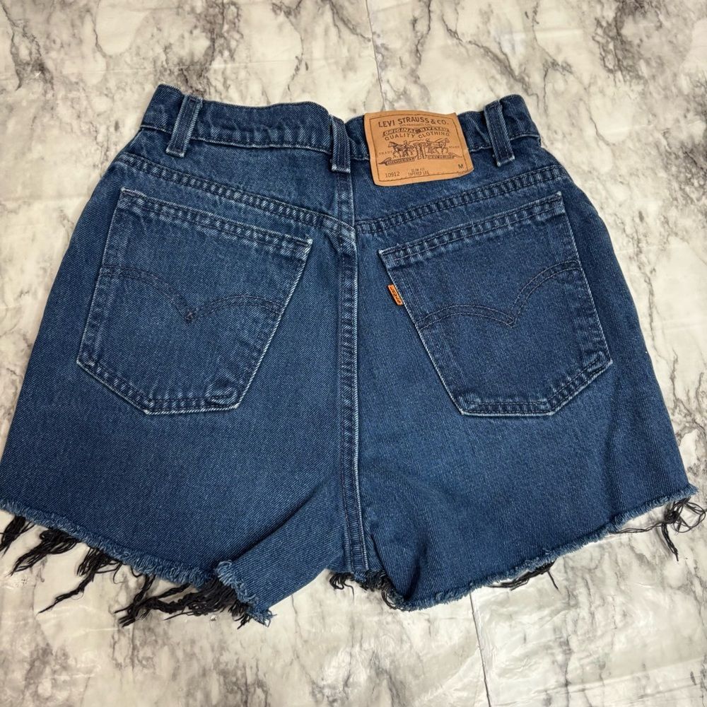 Vintage Levi’s Orange Tab Hi waisted shorts distressed cut size 9 dark wash boho